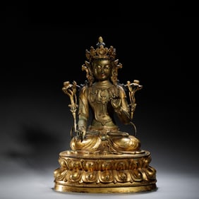 A SINO-TIBETAN BRONZE-GILT FIGURE OF PADMAPANI