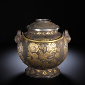 A BRONZE PARTLY GILT JAR WITH COVER