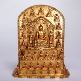 AN EXQUISITE BRONZE-GILT SHAKYAMUNI WITH ACOLYTES