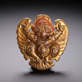 A TIBETAN BRONZE-GILT GARUDA