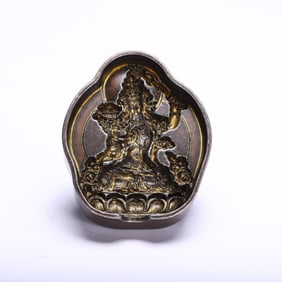 A BRONZE TSA-TSA OF MANJUSRI