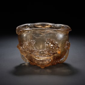 A CARVED ROCK CRYSTAL FROGS WASHER