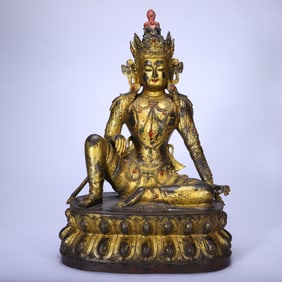 A BRONZE-GILT BODHISATTVA