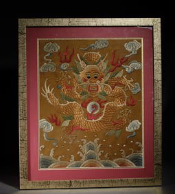 A CHINESE EMBROIDERED DRAGON HANGING PANEL