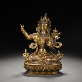 A SINO-TIBETAN BRONZE-GILT FIGURE OF MANJUSRI