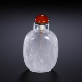 A CARVED ROCK CRYSTAL SNUFF BOTTLE