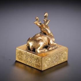 A BRONZE-GILT DEER SEAL