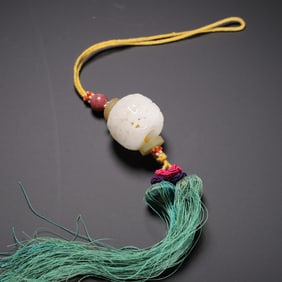 A CARVED WHITE JADE POMANDER CASE