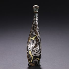 A FINE GOLD AND SILVER INLAID BRONZE BELTHOOK