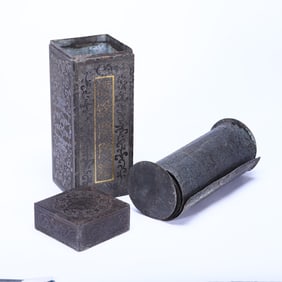 A BRONZE PARTLY GILT BUDDHIST SUTRA WITH BOX