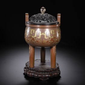 A GOLD INLAID BRONZE TRIPOD CENSER