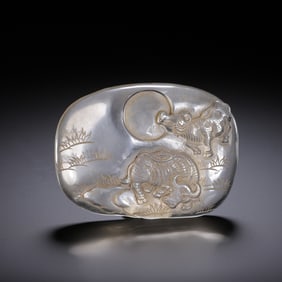 A CARVED ROCK CRYSTAL BUFFALOS INKWELL