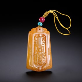 A CARVED TIANHUANG PLAQUE