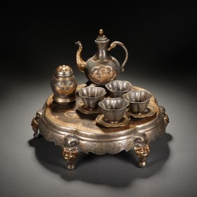A SET OF SILVER TABLE-WARES