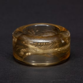 A ROCK CRYSTAL ARCHER RING