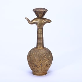 A SILVER-GILT FLOWER SCROLLS EWER