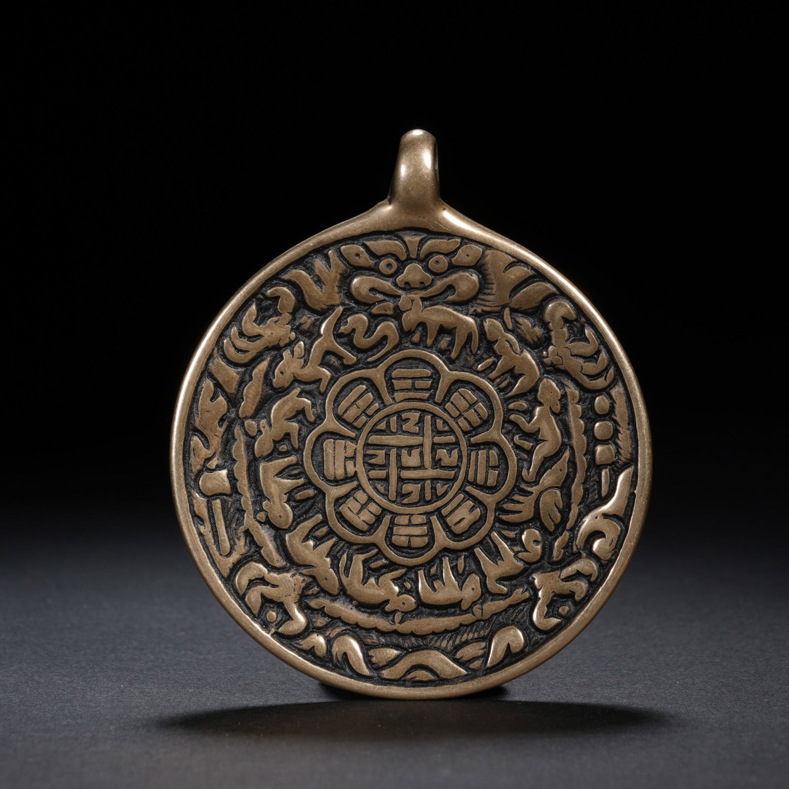 A TIBETAN AMULET PLAQUE (1 of 6)