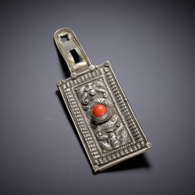 A COPPER ALLOY ORNAMENT