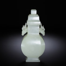 A FINE CARVED WHITE JADE VASE WITH COVER