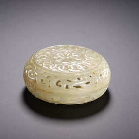 A CARVED WHITE JADE POMANDER BOX WITH COVER