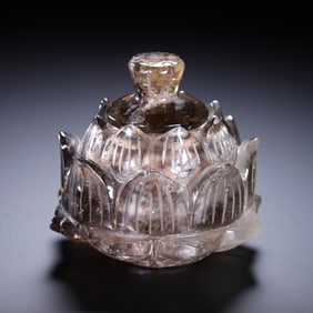 A CARVED ROCK CRYSTAL RELIQUARY JAR WITH COVER