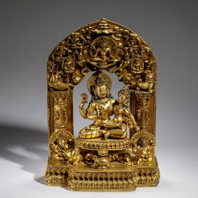 A FINE AND RARE BRONZE-GILT SHIVA WITH PARVATI