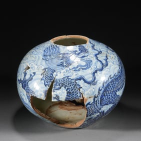 A BLUE AND WHITE DRAGON VESSEL