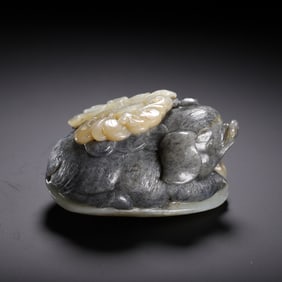 A CARVED JADE PIG