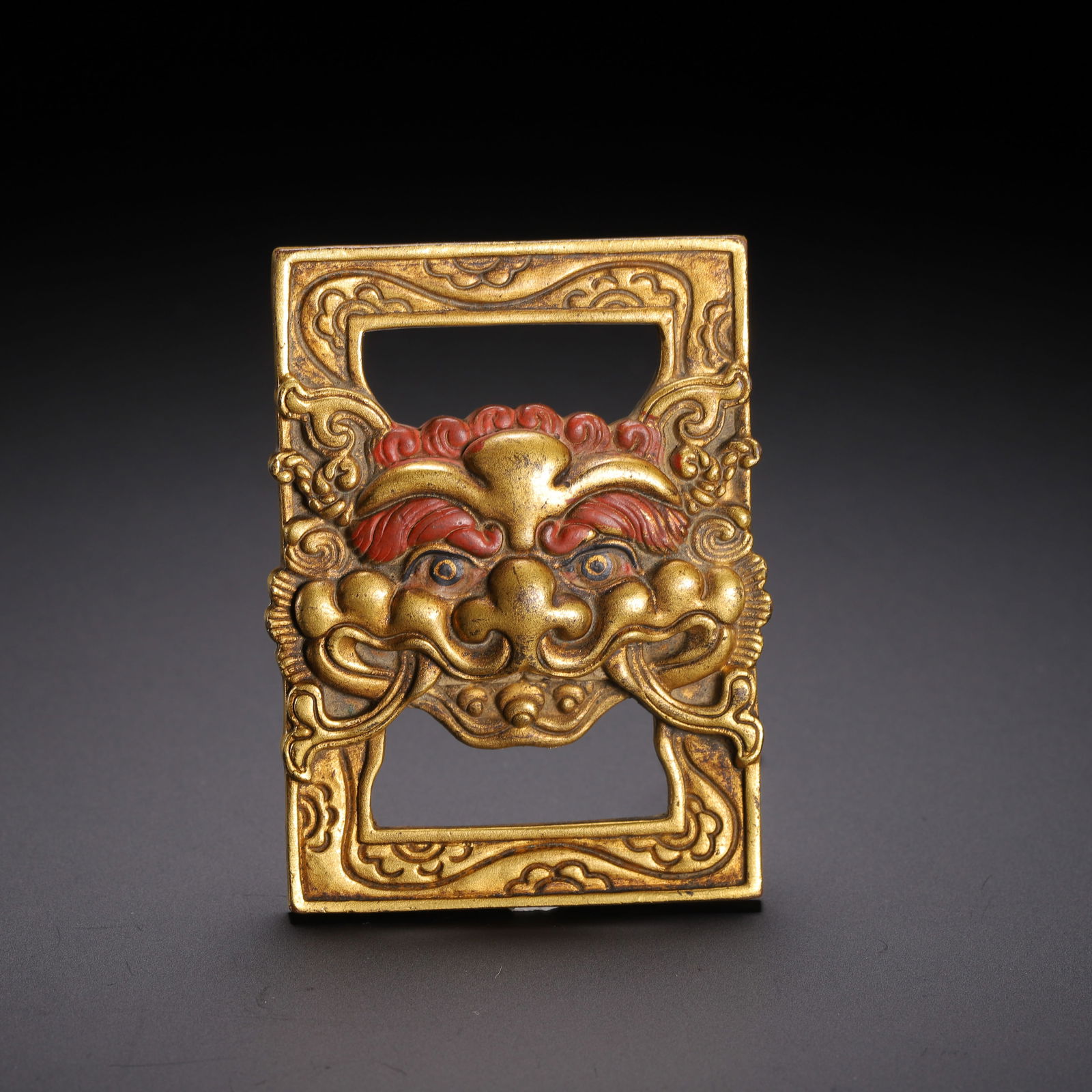 A BRONZE-GILT KIRTIMUKHA SUTRA HOOK (1 of 9)