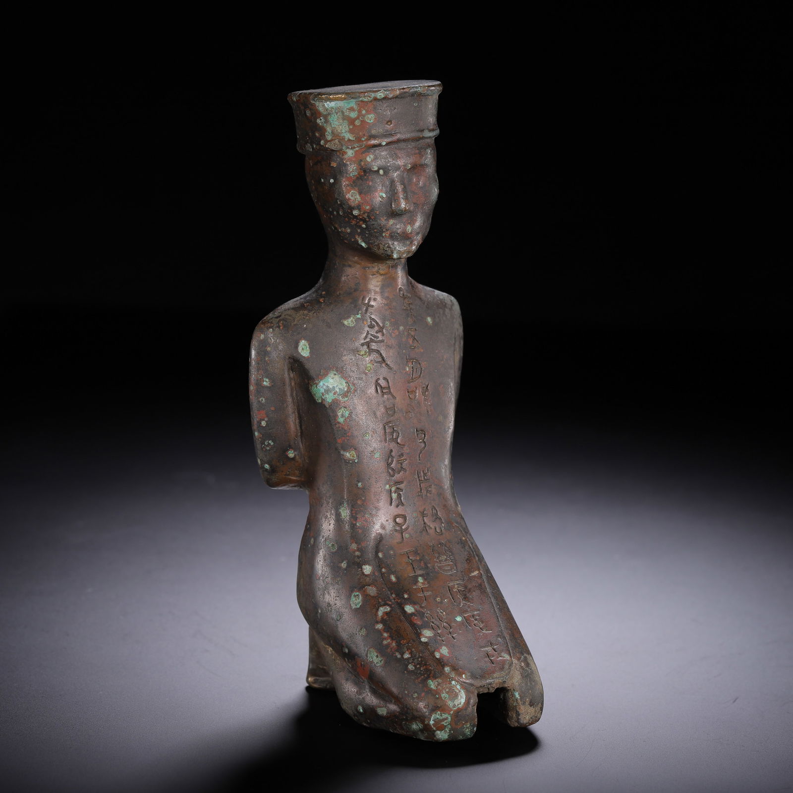 AN IRON KNEELING FIGURE (1 of 9)