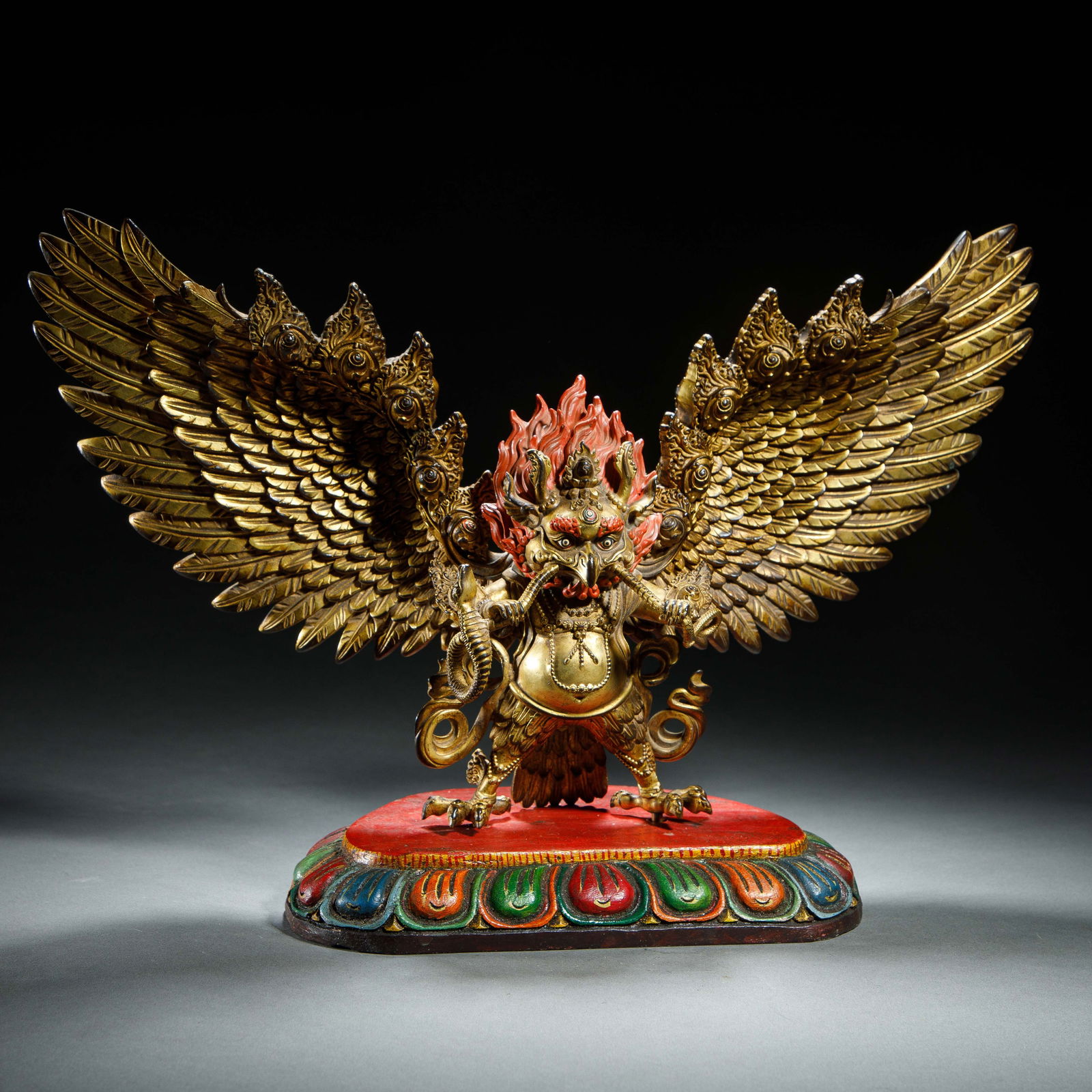 A BRONZE-GILT FIGURE OF GARUDA (1 of 8)