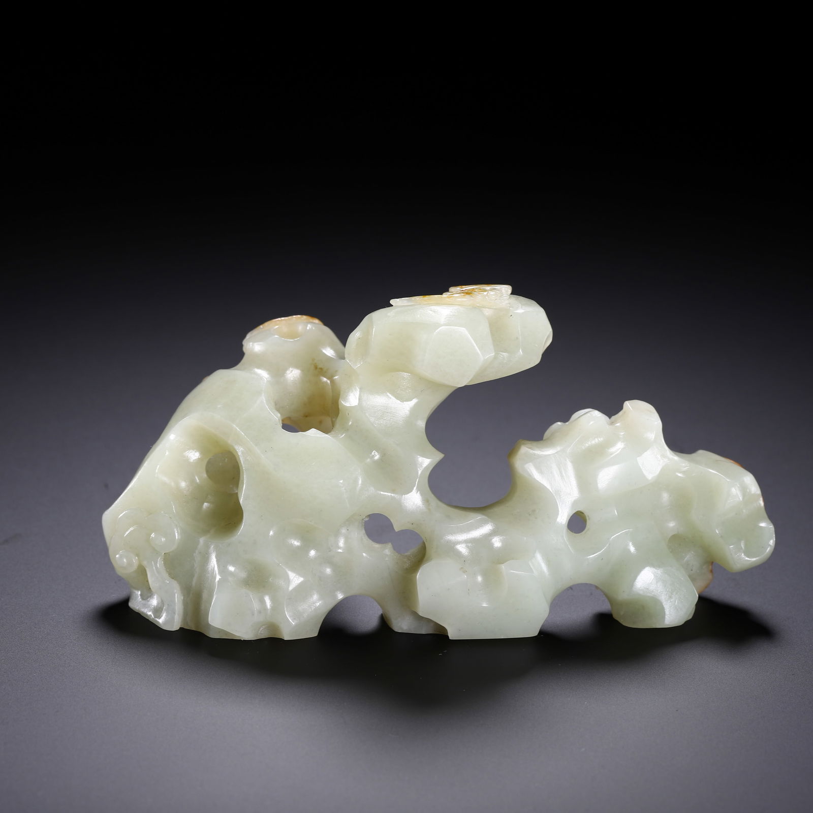 A CARVED WHITE JADE LITERATI ROCK (1 of 9)