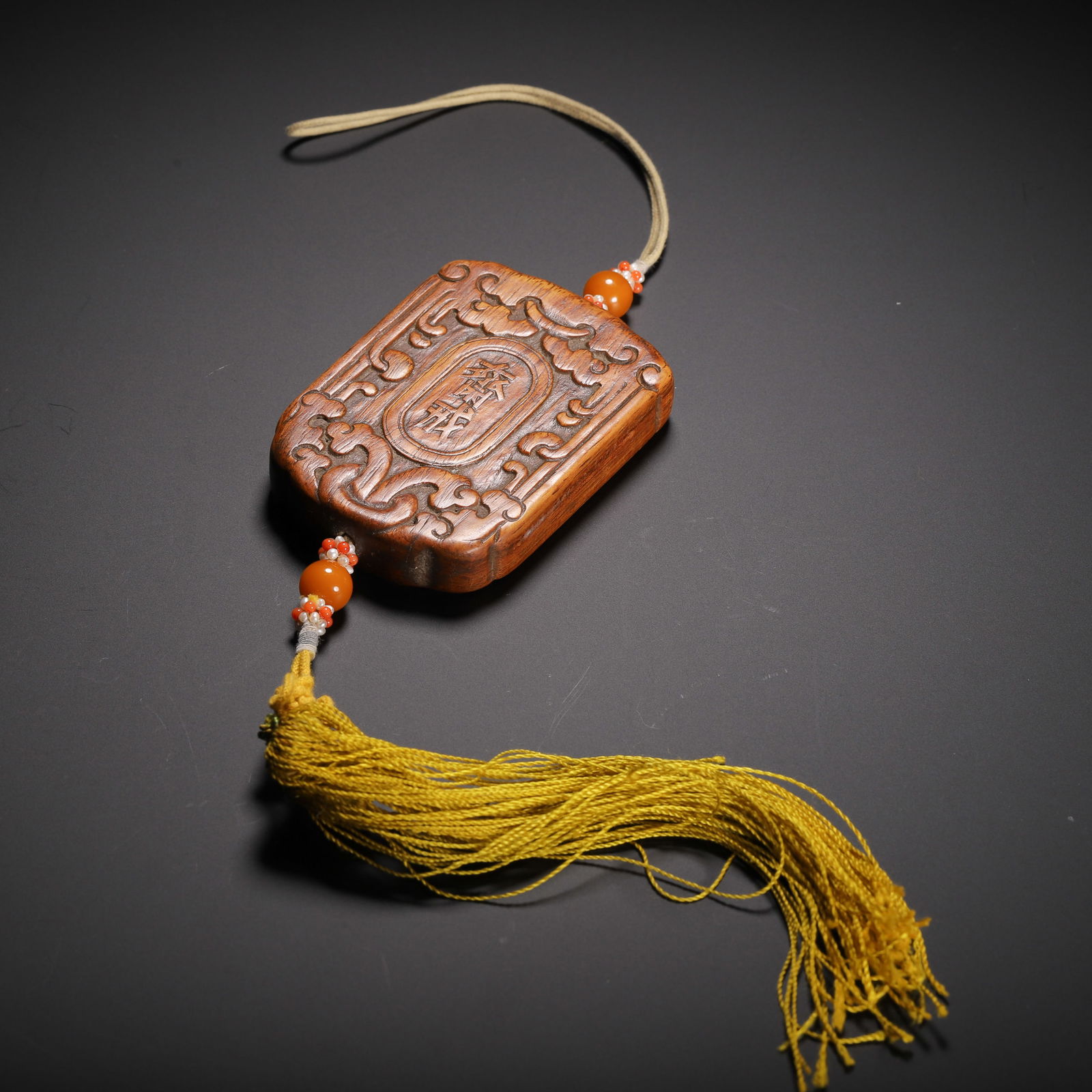 A CARVED HUANGHUALI ABSTINENCE PLAQUE (1 of 9)