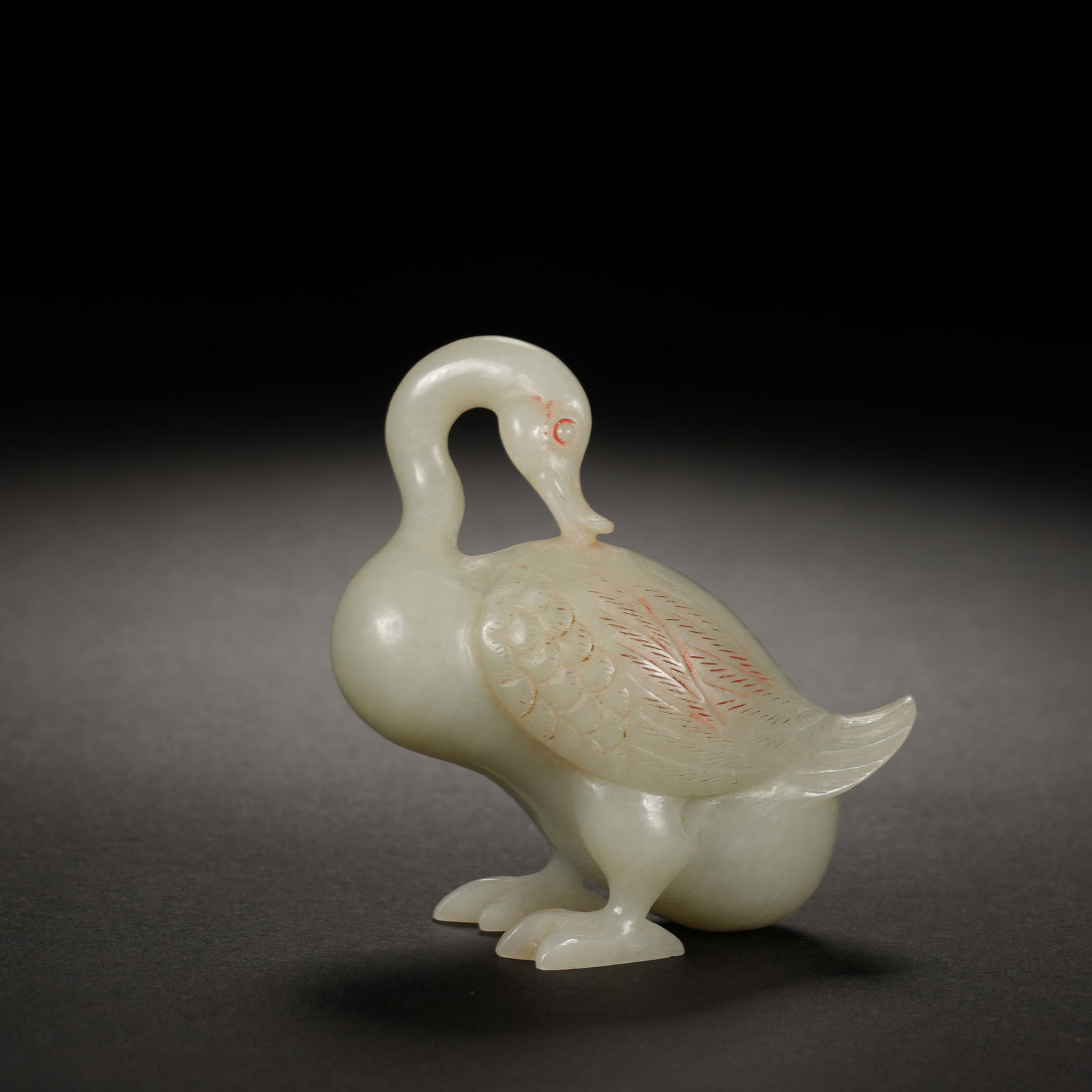 A CARVED WHITE JADE GOOSE (1 of 8)