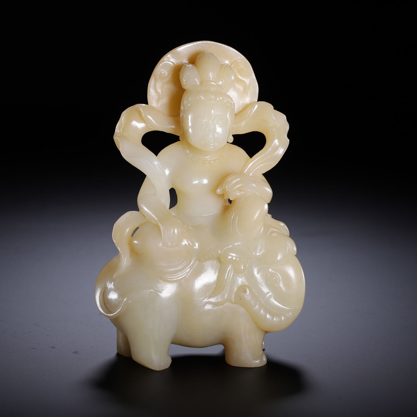 A CARVED WHITE JADE SAMANTABHADRA (1 of 9)