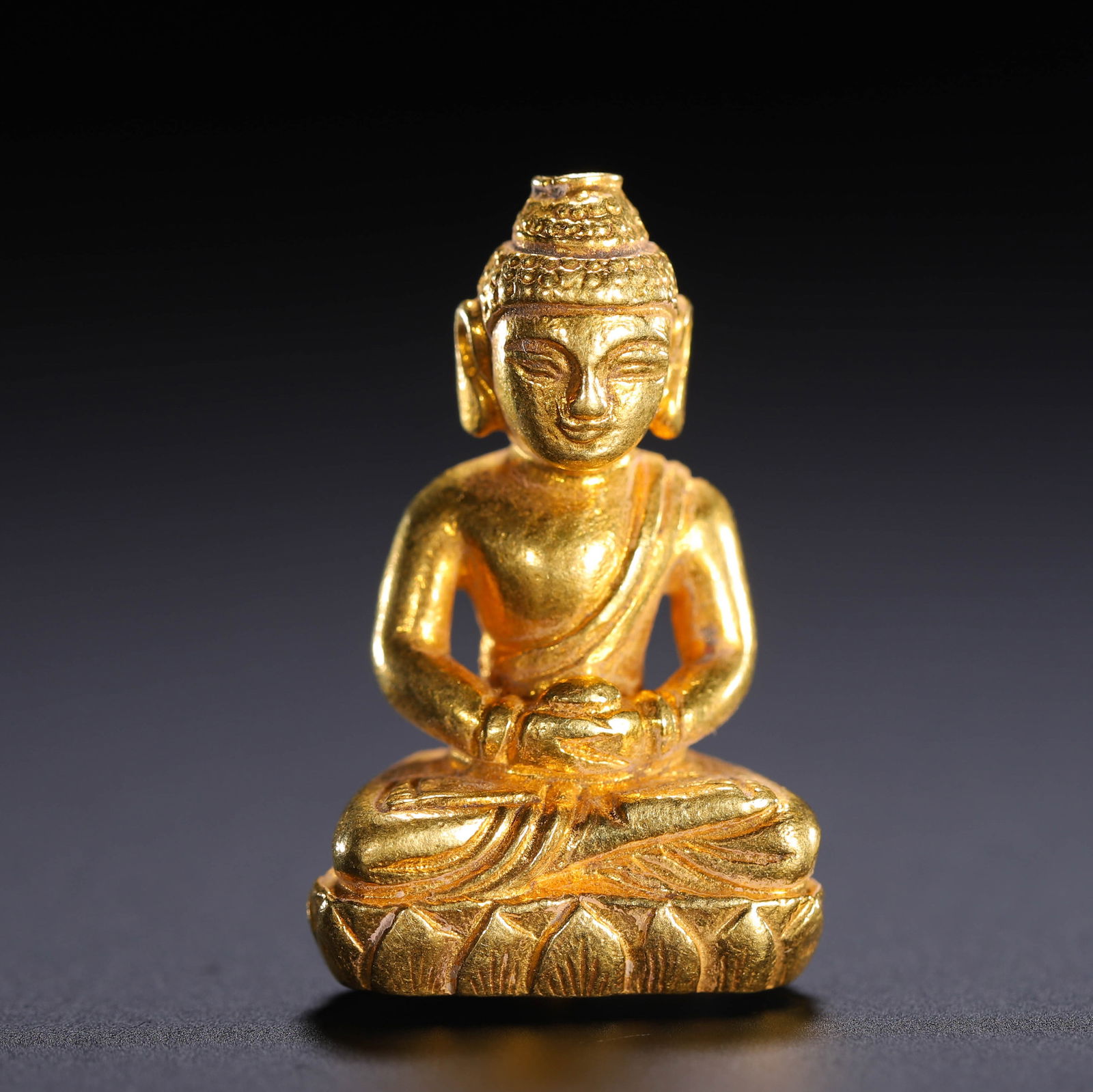 A GOLD FIGURE OF AMITABHA (1 of 9)