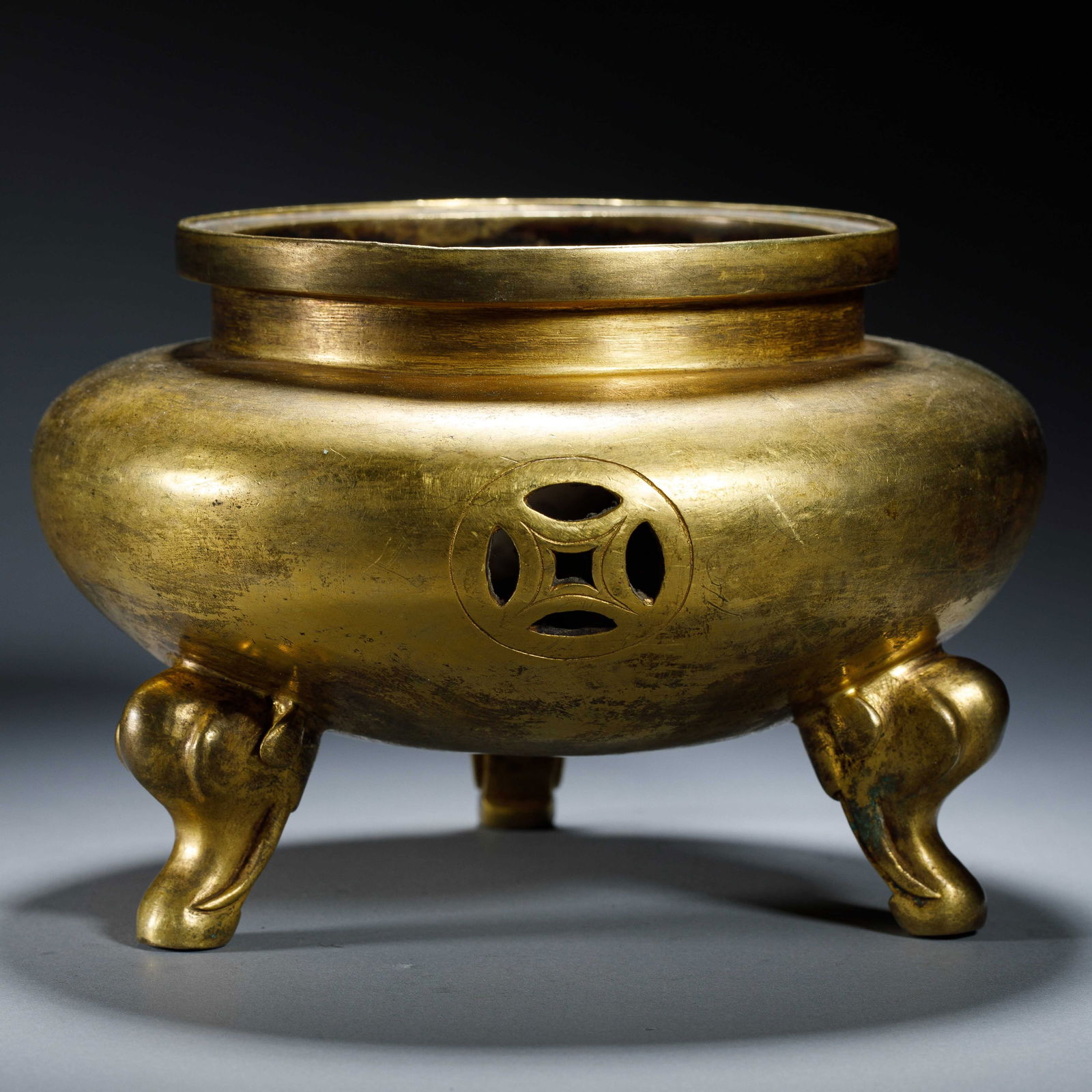 A BRONZE-GILT TRIPOD CENSER (1 of 5)