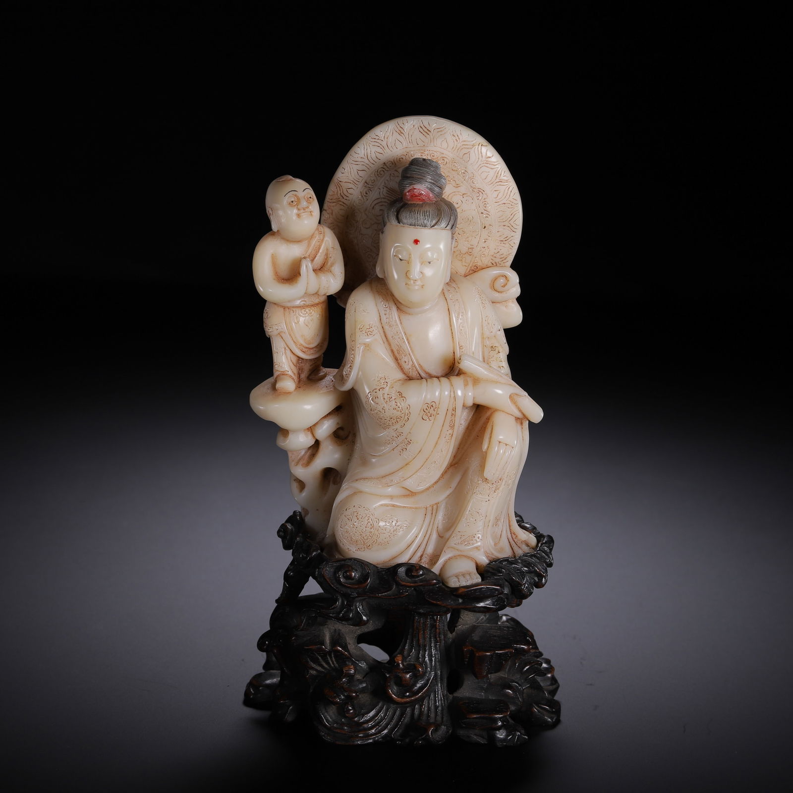 A CARVED SHOUSHAN STONE GUANYIN WITH BOY (1 of 9)