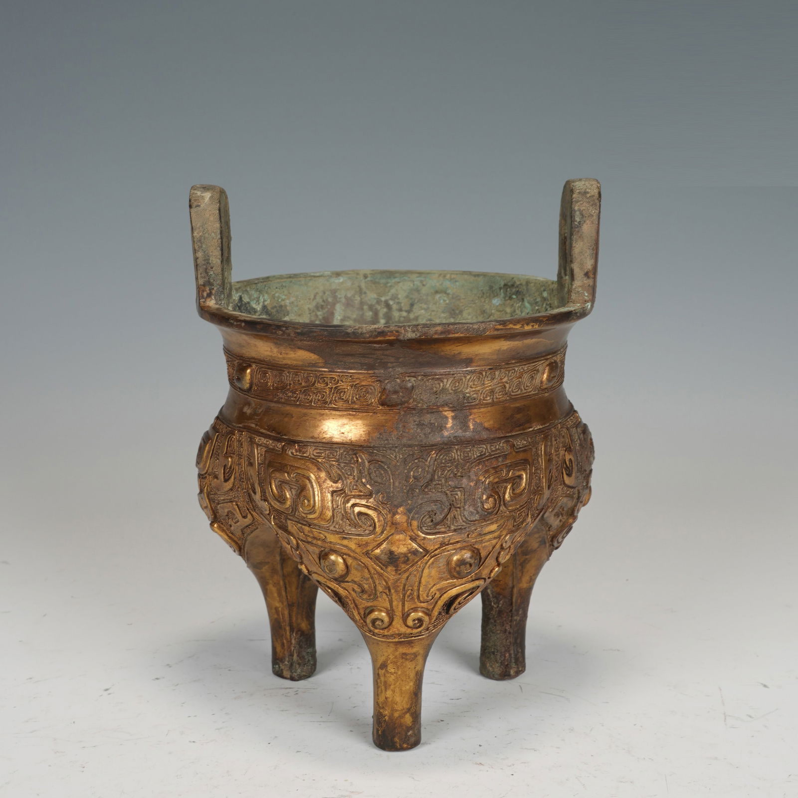 A BRONZE-GILT TRIPOD CENSER (1 of 9)