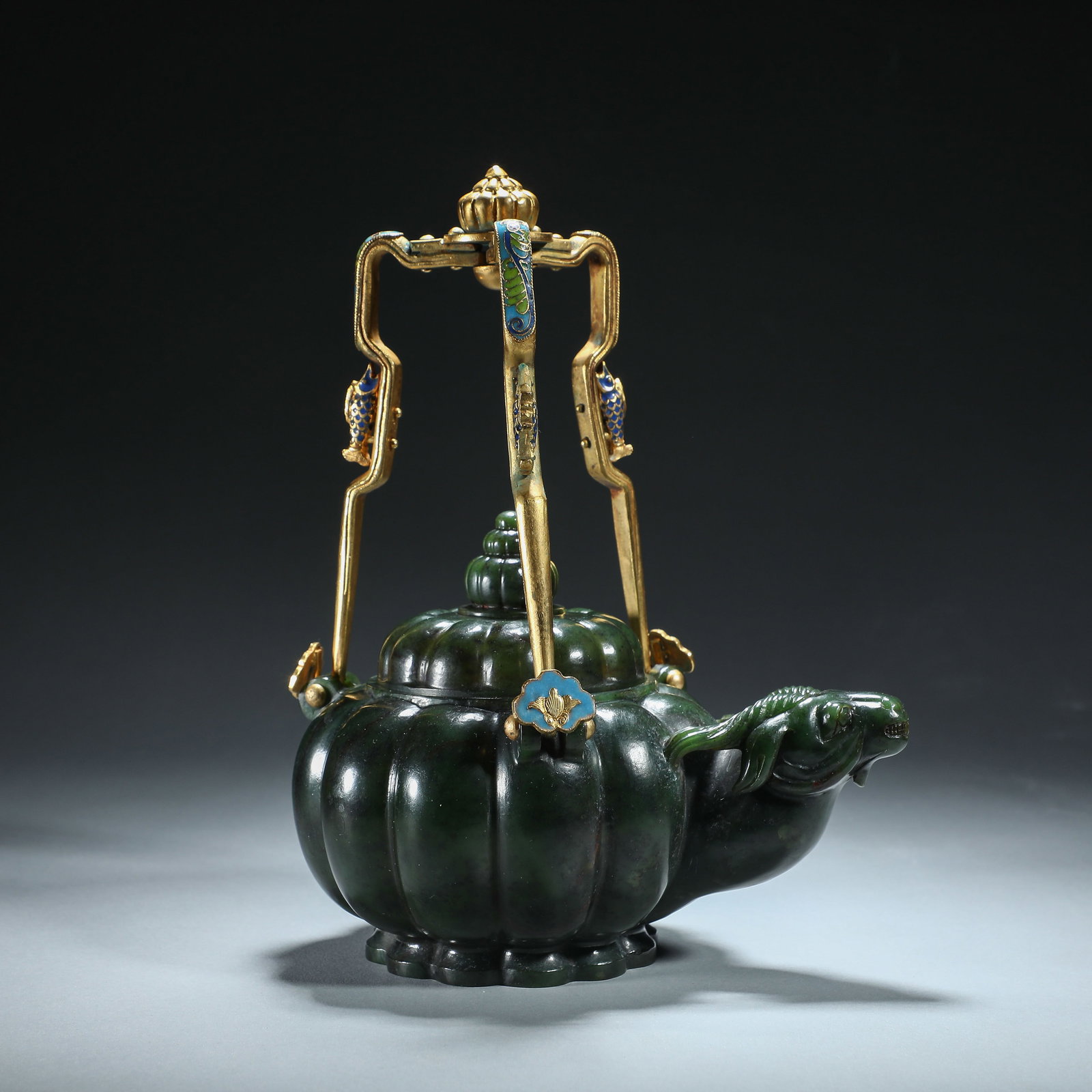 A CHINESE IMPERIAL CARVED SPINACH GREEN JADE RAM TEAPOT (1 of 7)