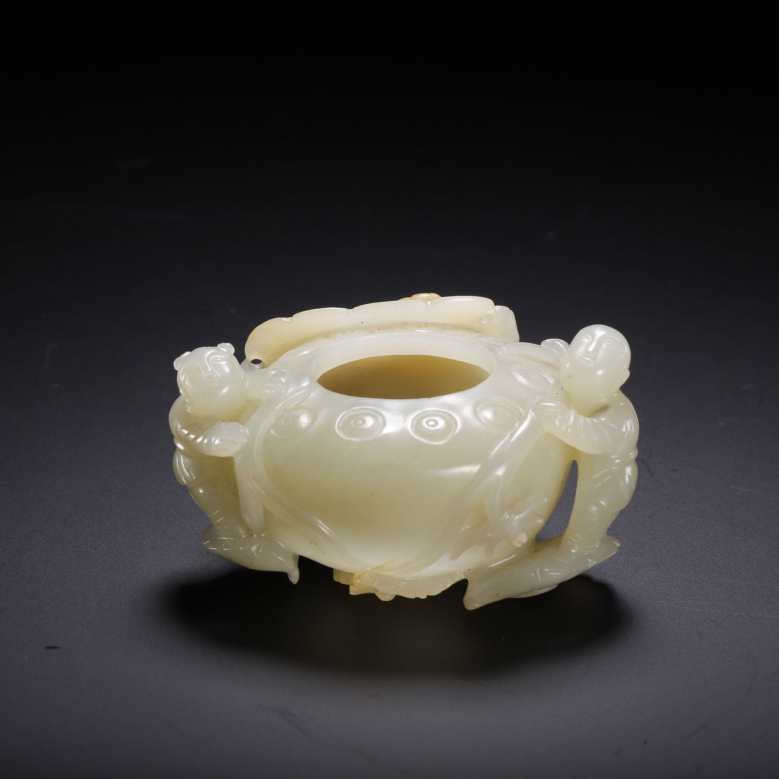 A CARVED WHITE JADE WASHER (1 of 9)