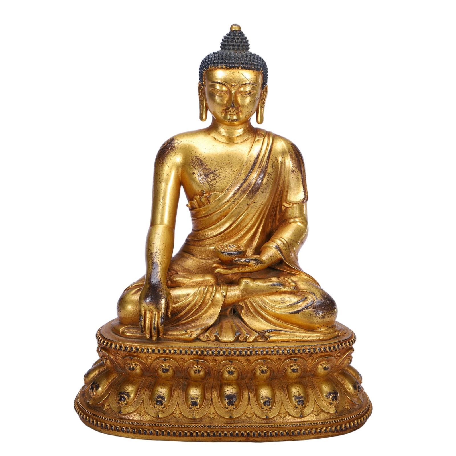 A BRONZE-GILT SEATED SHAKYAMUNI (1 of 9)