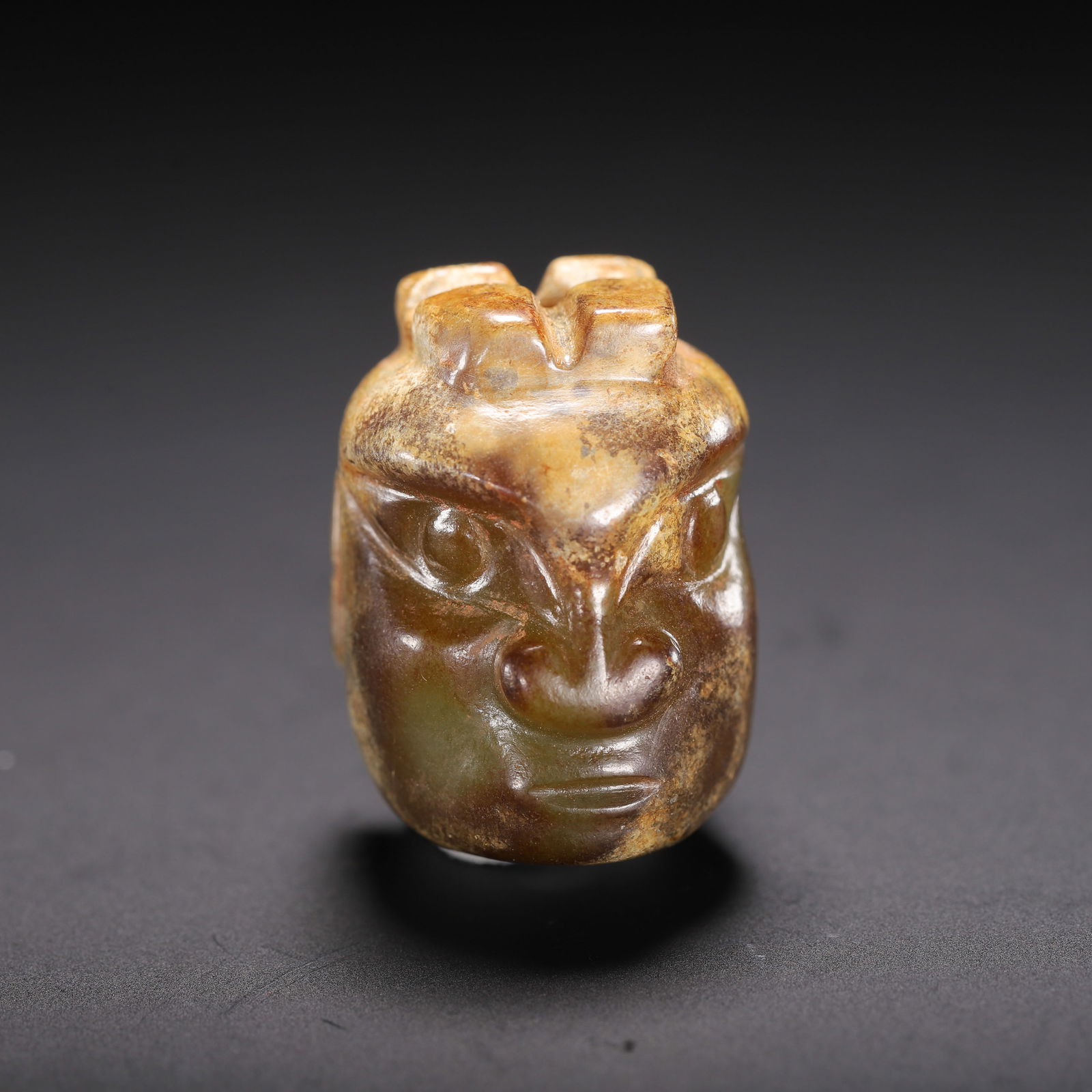 A CARVED JADE MYTHICAL BEAST HEAD (1 of 9)