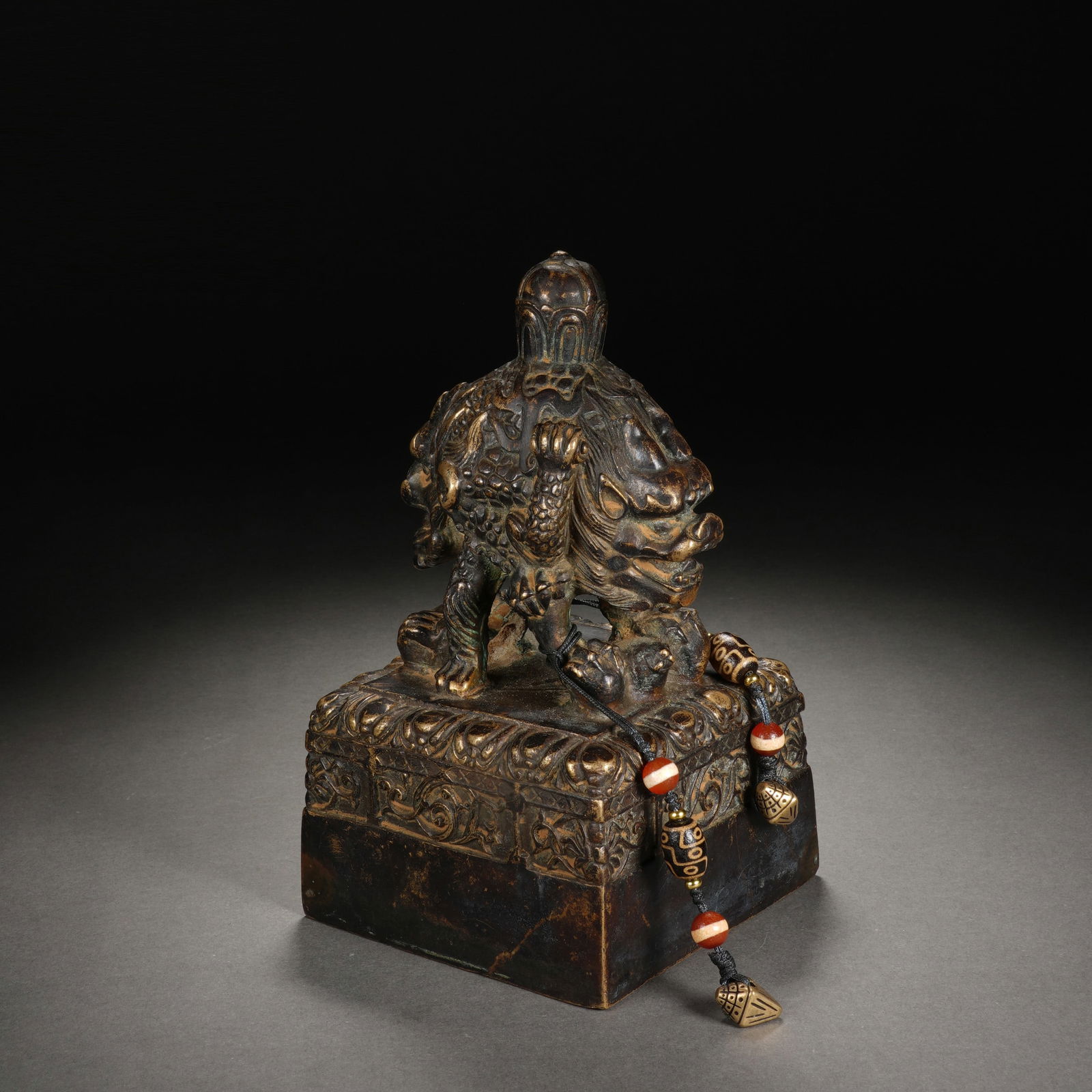 A TIBETAN BRONZE DRAGON SEAL (1 of 11)