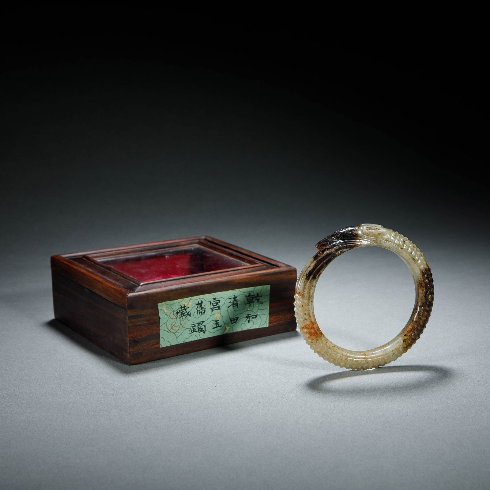 A CARVED JADE BANGLE (1 of 7)