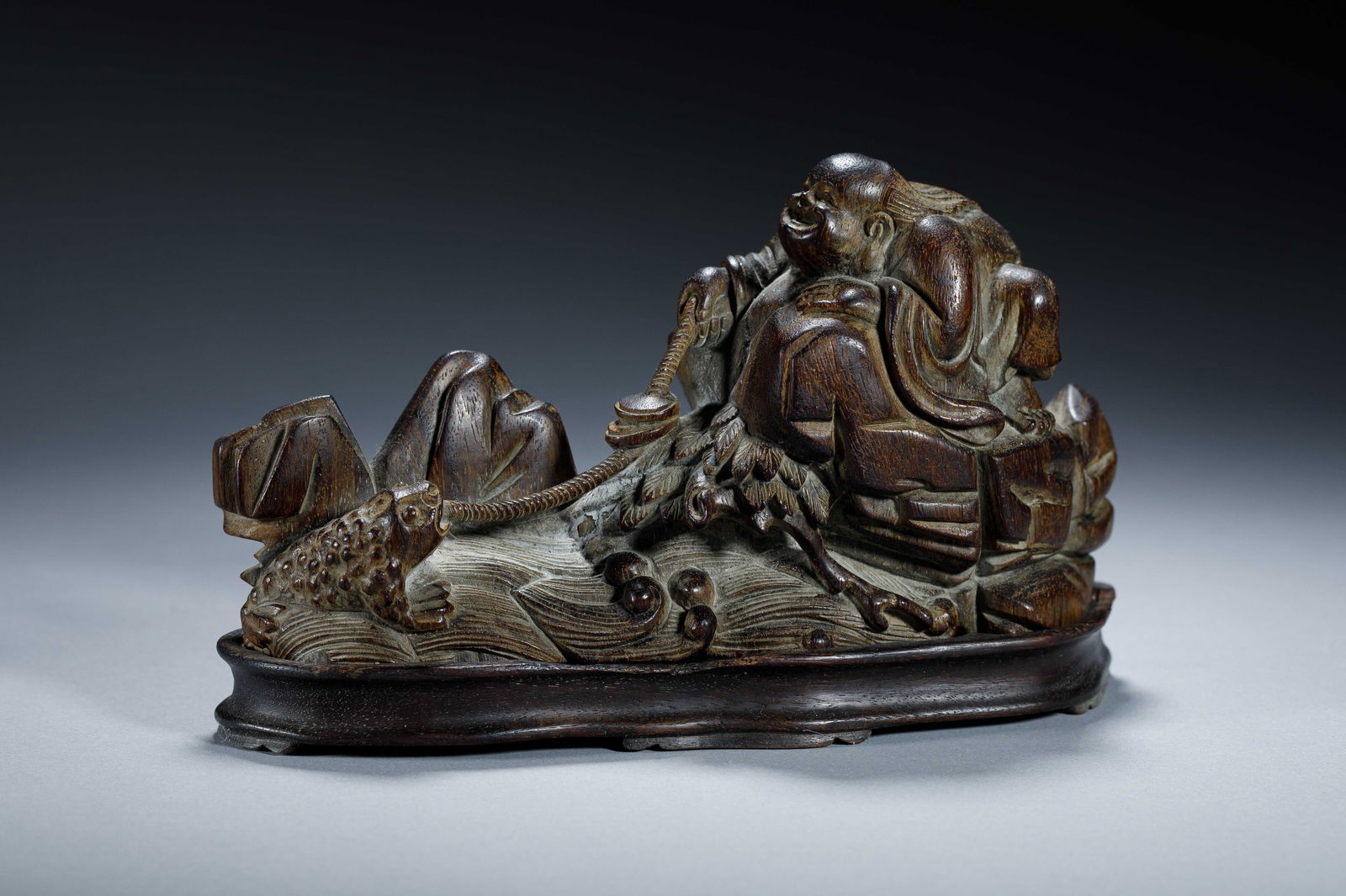 A CARVED ALOESWOOD CHENXIANG LIUHAI WITH GOLDEN FROG (1 of 7)