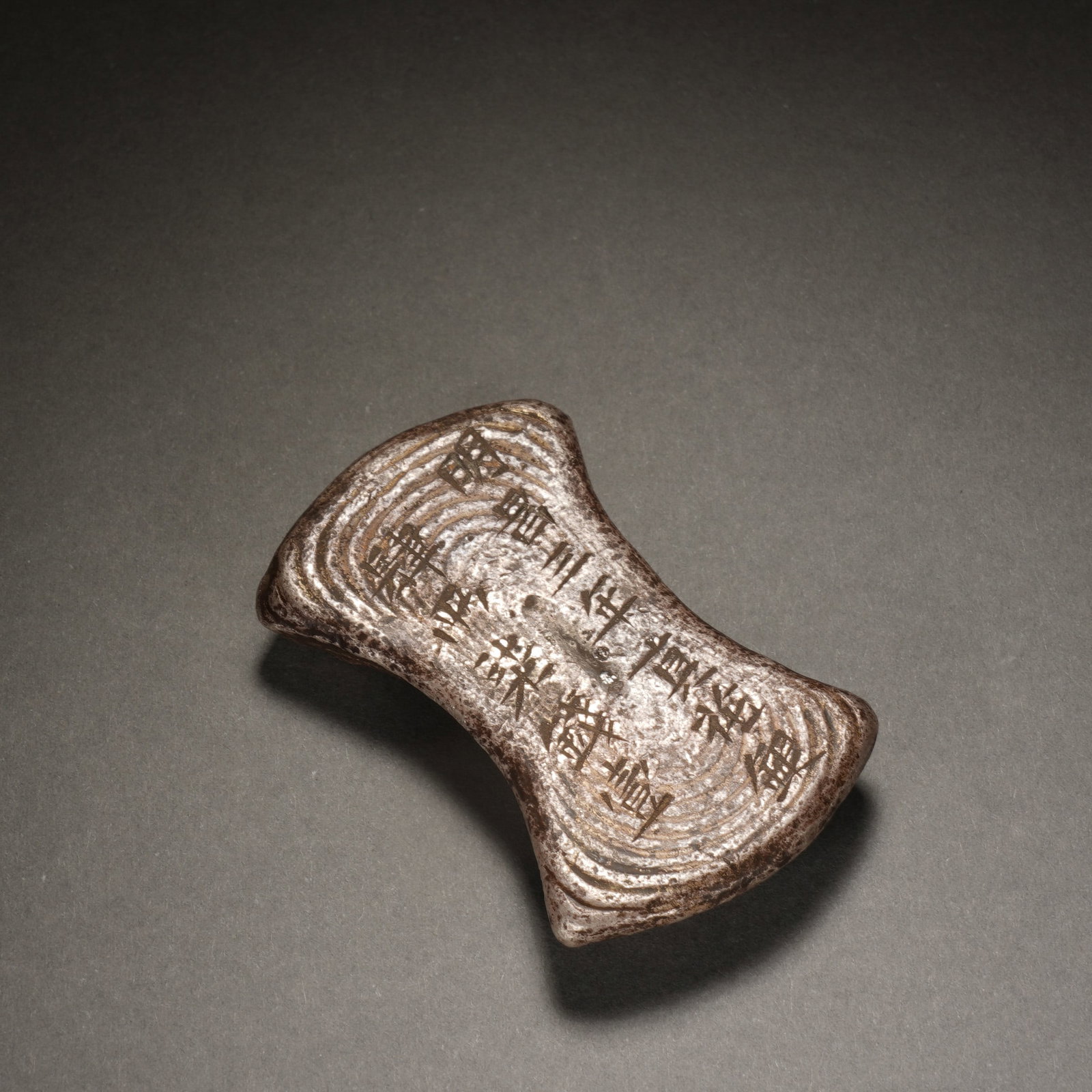 AN INSCRIBED CHINESE SILVER INGOT (1 of 5)