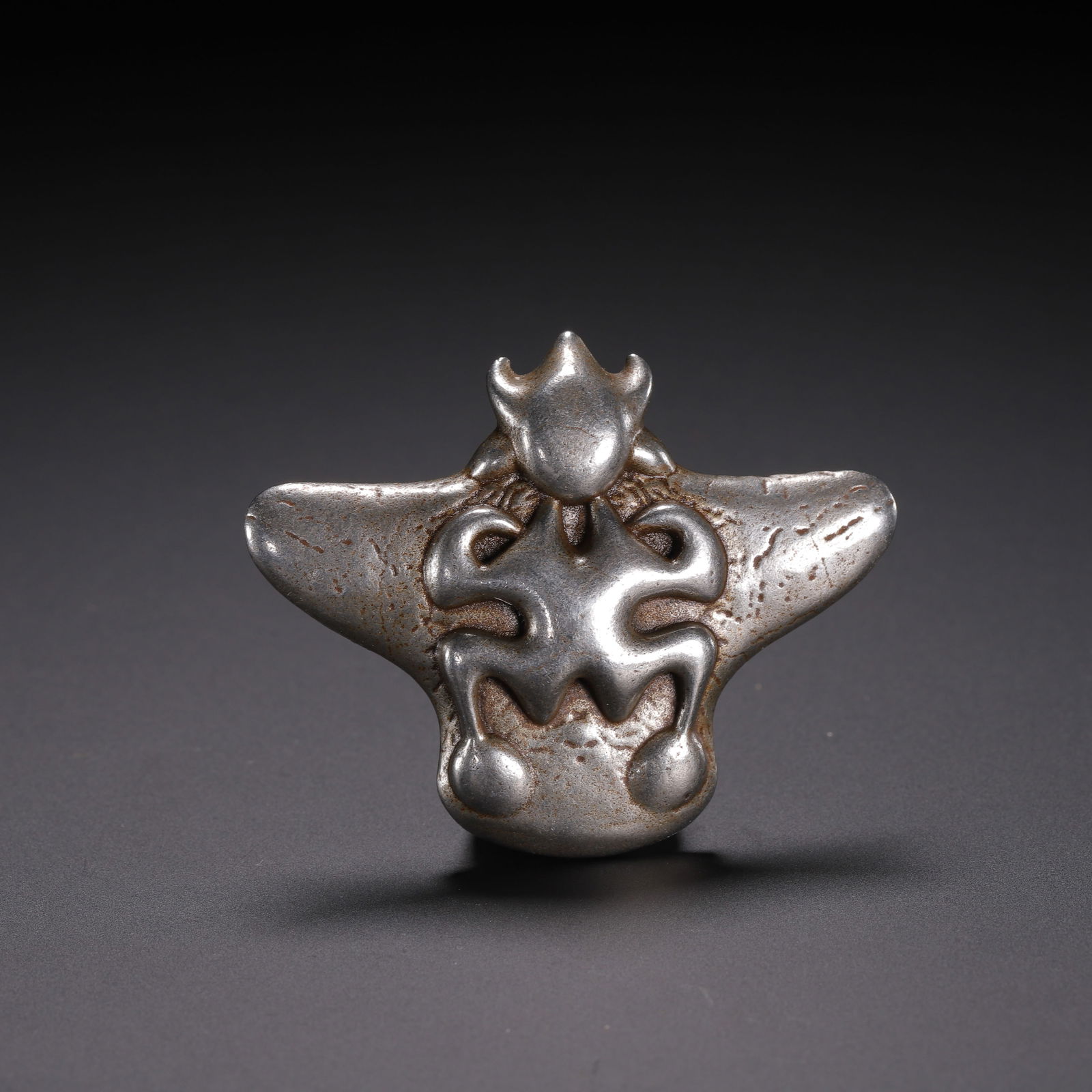 A TIBETAN COPPER GARUDA PENDANT (1 of 9)