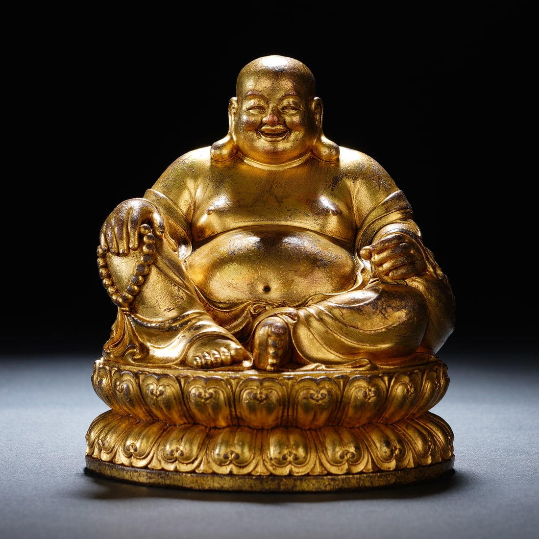 A CHINESE GILT-BRONZE BUDAI BUDDHA STATUE (1 of 8)