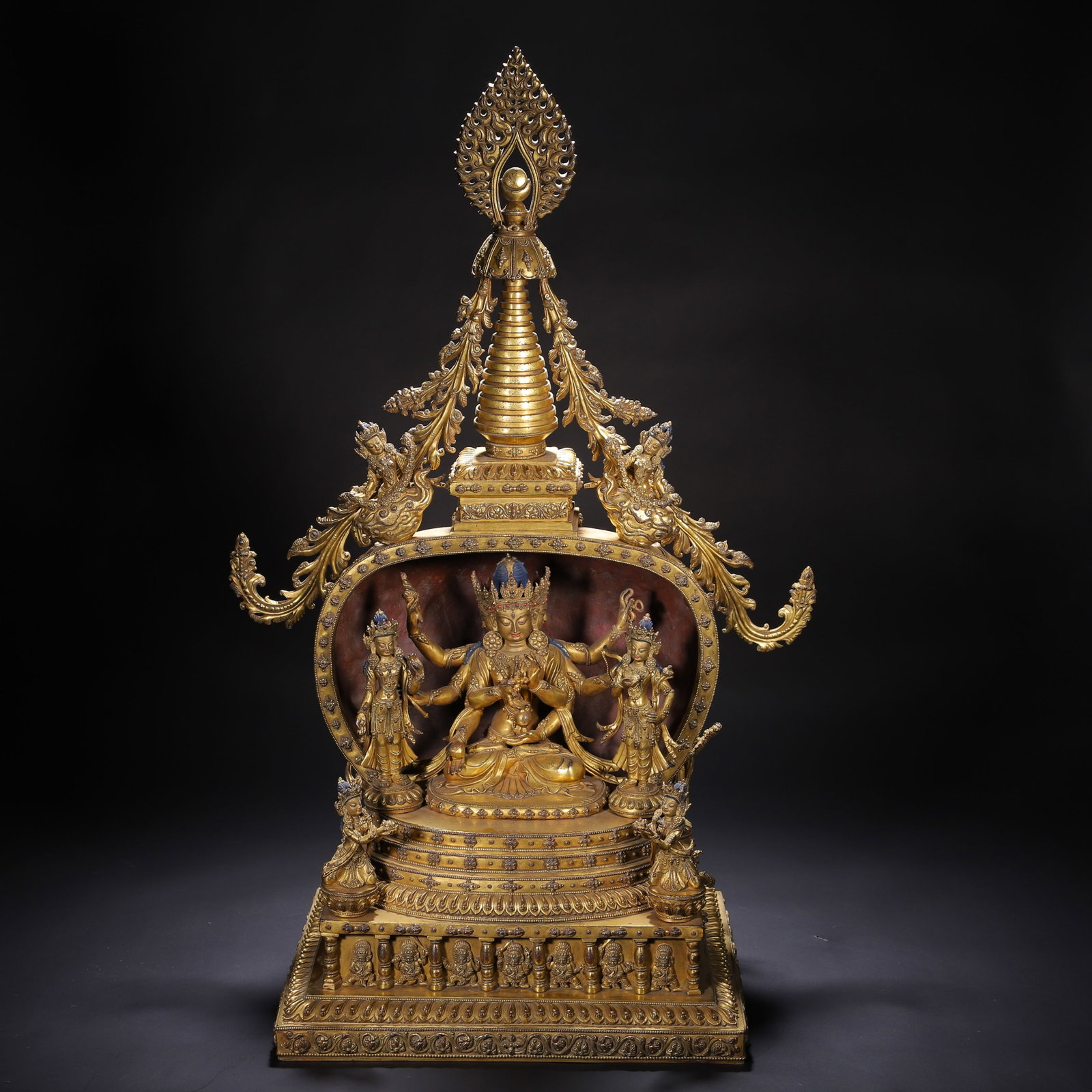 Chinese Gilt Bronze Buddhist Altar Shrine: Chinese Gilt Bronze Buddhist Altar Shrine This is a magnificent Chinese gilt bronze Buddhist altar shrine, measuring 46 cm in length, 29 cm in width, and 74 cm in height. At the heart of the shrine si